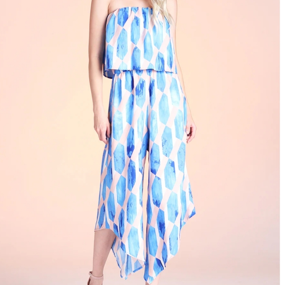 Tyche strapless jumpsuit with slanted hemline on pants pockets